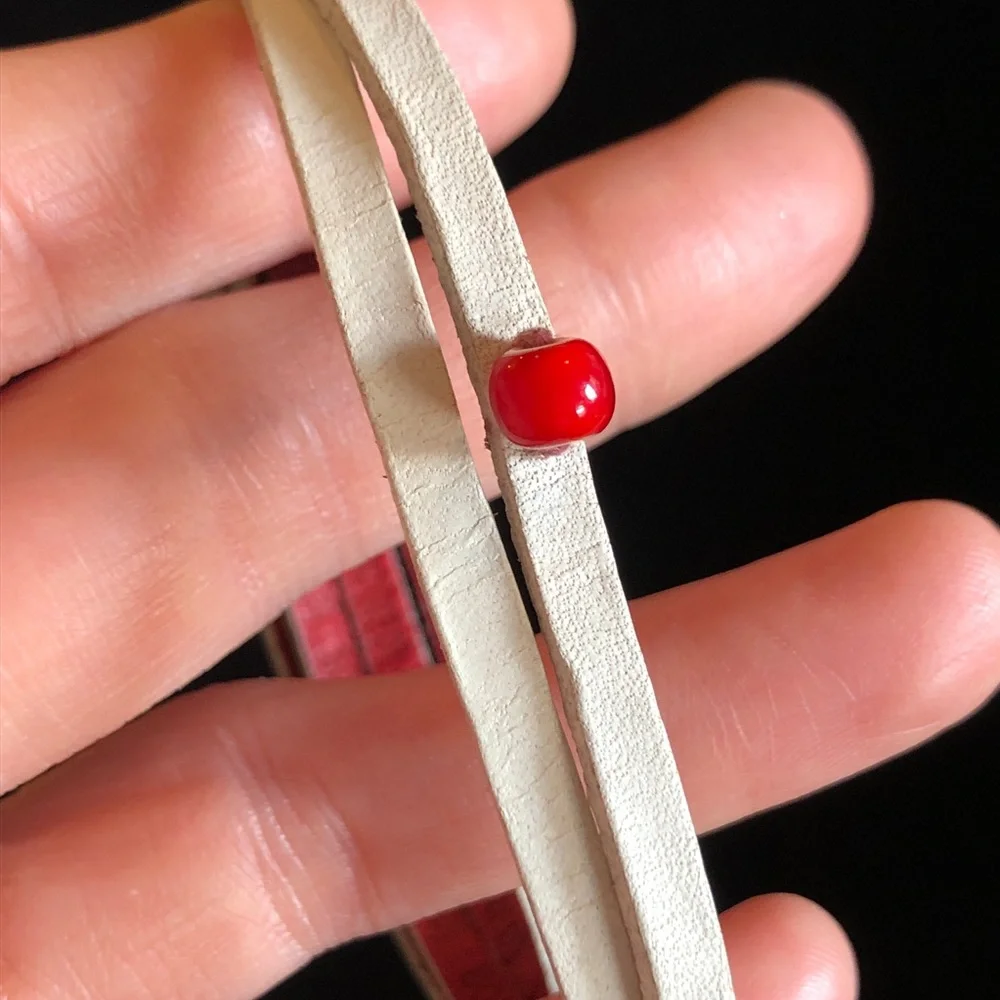 Elegant White Bracelet with Red Bead and Inspirational “Red” Quotes
